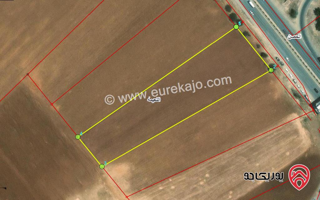 قطعة ارض تجارية مساحة 8 دونم للبيع في اربد على طريق اربد عمان غرب جسر النعيمة 