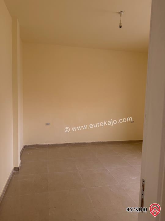 شقة طابق أول مساحة 128م للبيع في عمان - الجبل الأخضر حي نزال الشمالي 