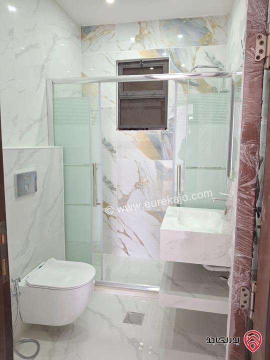 شقة جديدة طابق أول مساحة 170م للبيع في عمان - الرابية