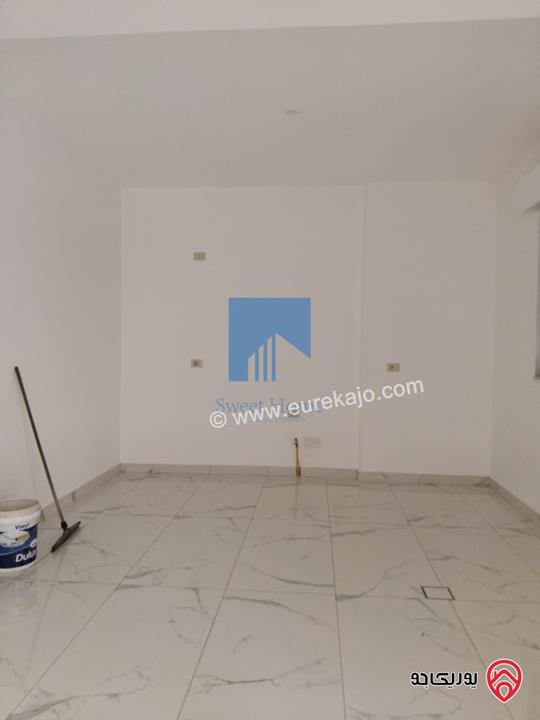 شقة أرضية فاخرة للبيع في عمان - أم أذينة 255م مع حديقة وترسات 100م لم تسكن