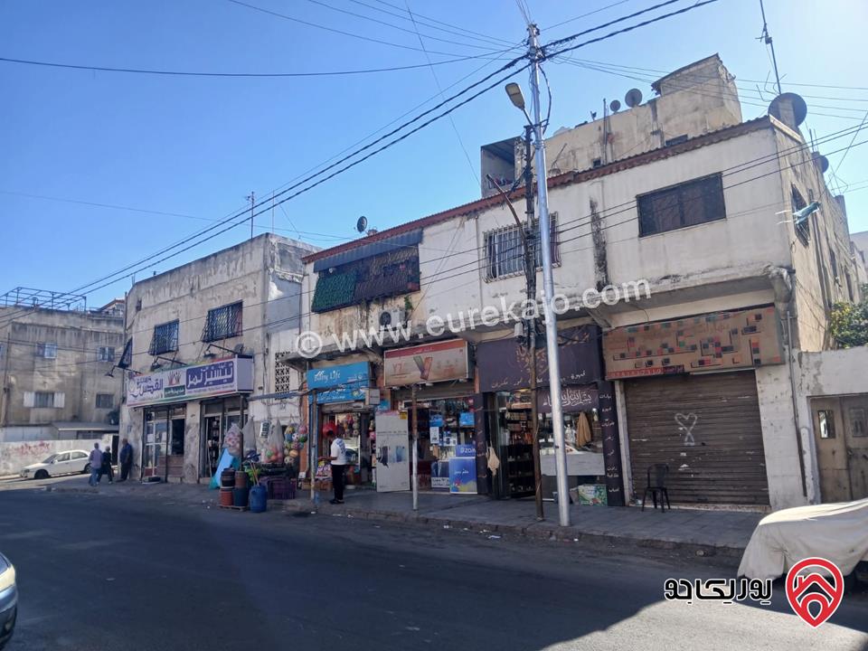 مجمع تجاري 6 ابواب تجارية و 5 شقق سكنية على أرض 531م للبيع في عمان - حي نزال