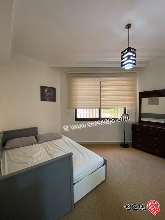 شقة طابق شبه ارضي مساحة 200م داخلي و 70م خارجي للبيع مفروشة في عمان - عبدون