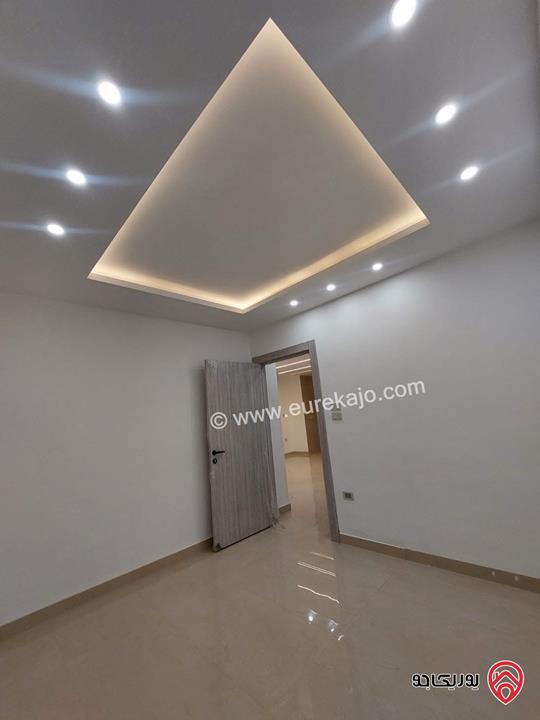 شقة طابق ارضي مساحة 125م مع ترس 30م للبيع في عمان - البنيات