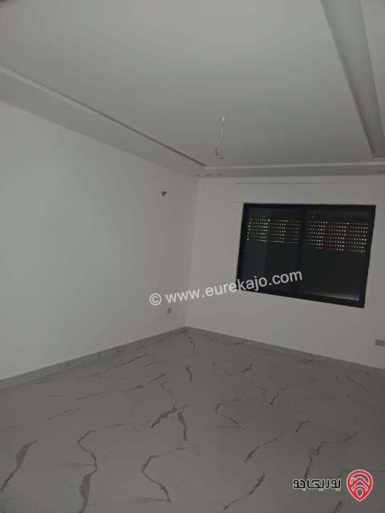 شقة مميزة تشطيب سوبر ديلوكس طابق ارضي مساحة 169م + ترس بناء جديد للبيع في عمان - المقابلين