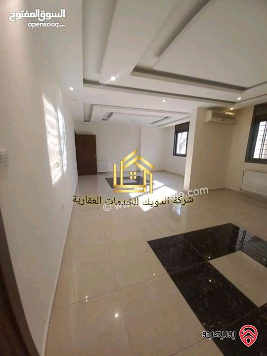 شقة سوبر ديلوكس طابق ارضي 250م داخلي و 150م خارجي للايجار في عمان - خلدا 