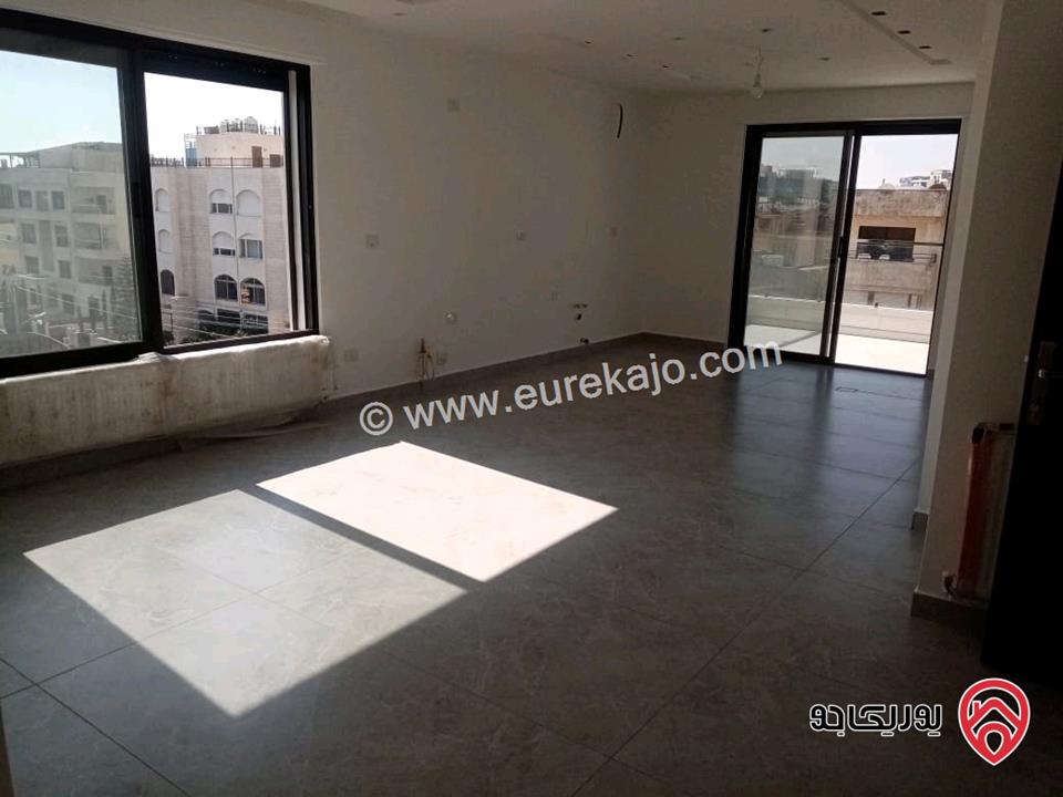 شقة جديدة مساحة 220م طابق أخير مع روف للبيع في عمان - ام السماق 