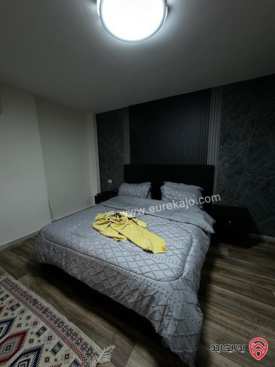 شقة أرضية مفروشة مساحة 120م داخلي و 100م خارجي للإيجار في عمان - الشميساني