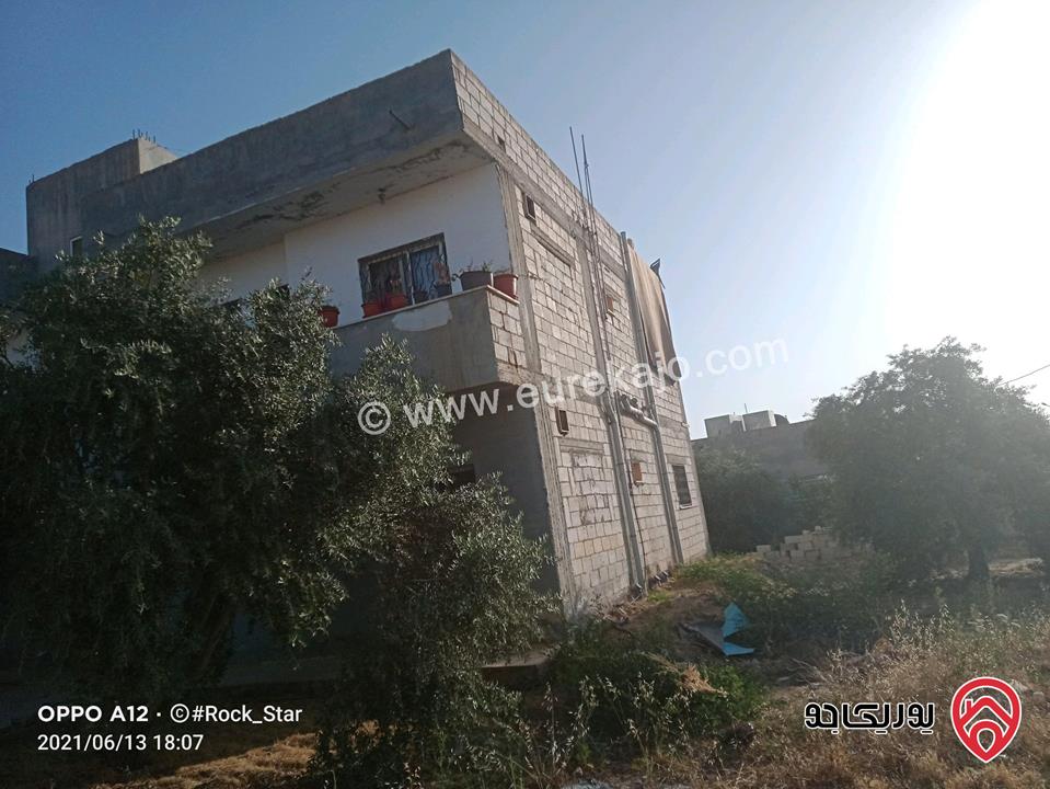 عقار سكني مكون من اربع شقق للبيع في اربد - سحم