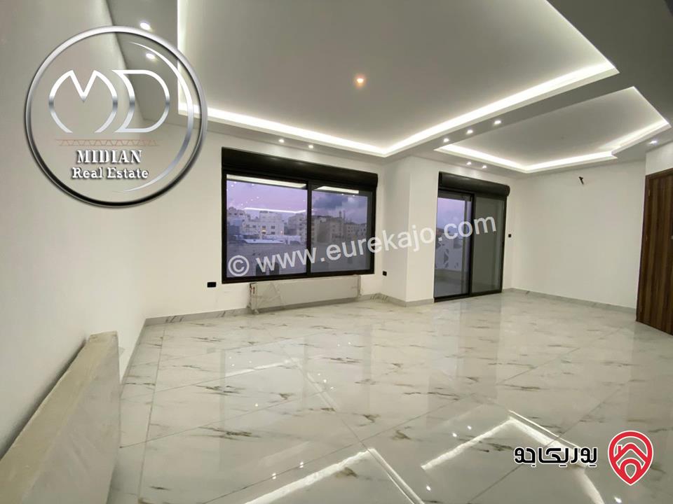 شقة دوبلكس جديدة للبيع في عمان - خلدا طابق أخير مع روف مساحة 210م مع تراسات اطلالة جميلة بسعر مميز