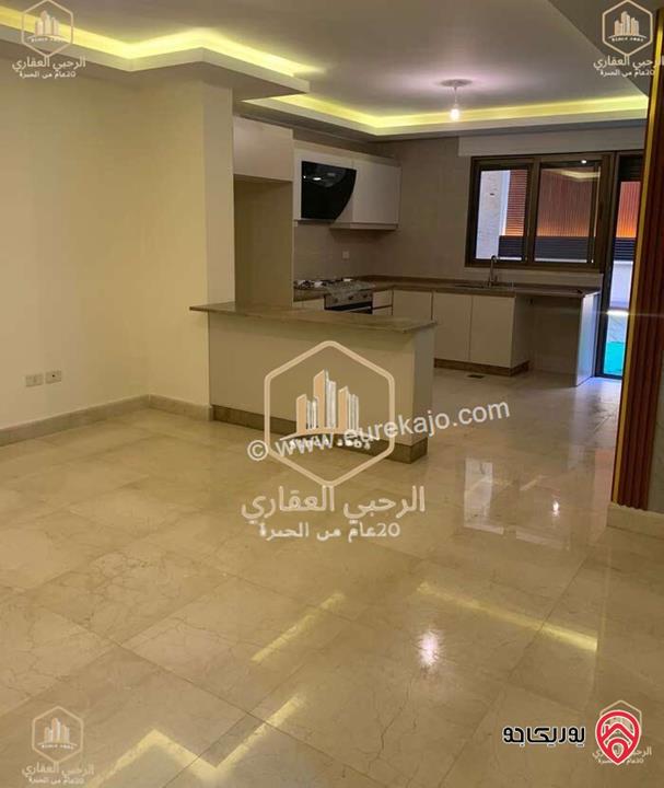 شقة سوبر ديلوكس شبه أرضية مساحة 95م داخلي و 40م خارجي للبيع في عمان - الدوار الرابع 