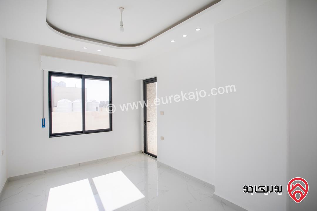 شقة طابق ثالث مساحة 110م اطلالة بانوراما للبيع في عمان - ابو علندا من شركة الاسكان كاش او اقساط  