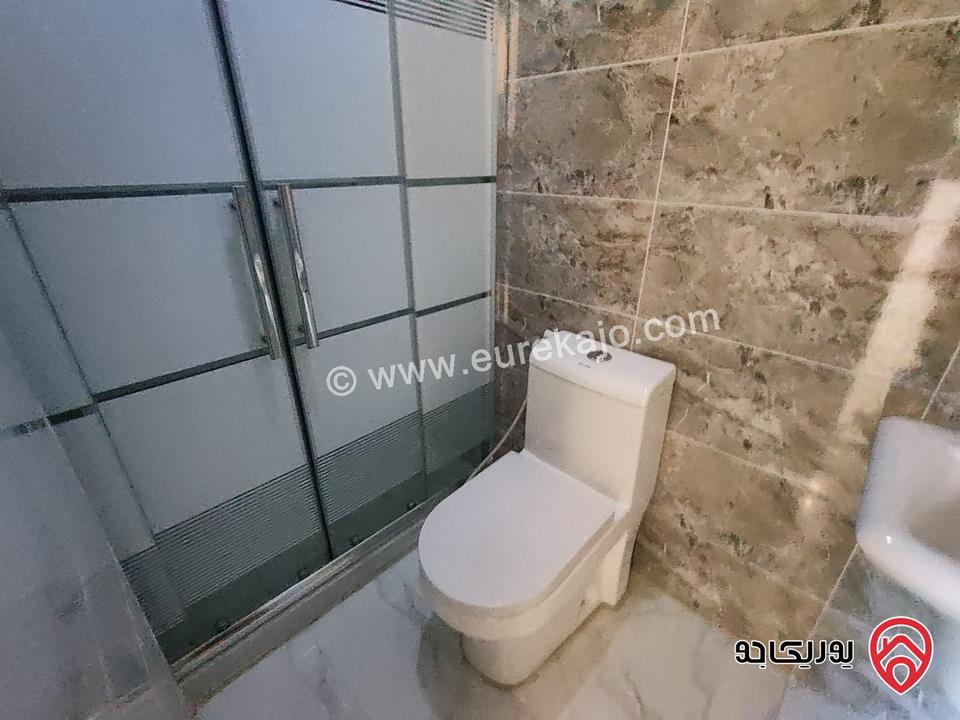 شقة ارضية مساحة 135م للبيع في عمان - جبل الزهور          	 