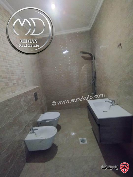 شقة شبه ارضي للبيع في عمان - ضاحية النخيل مساحة 210م مع ترس و حديقة 100م جديدة لم تسكن بسعر مميز