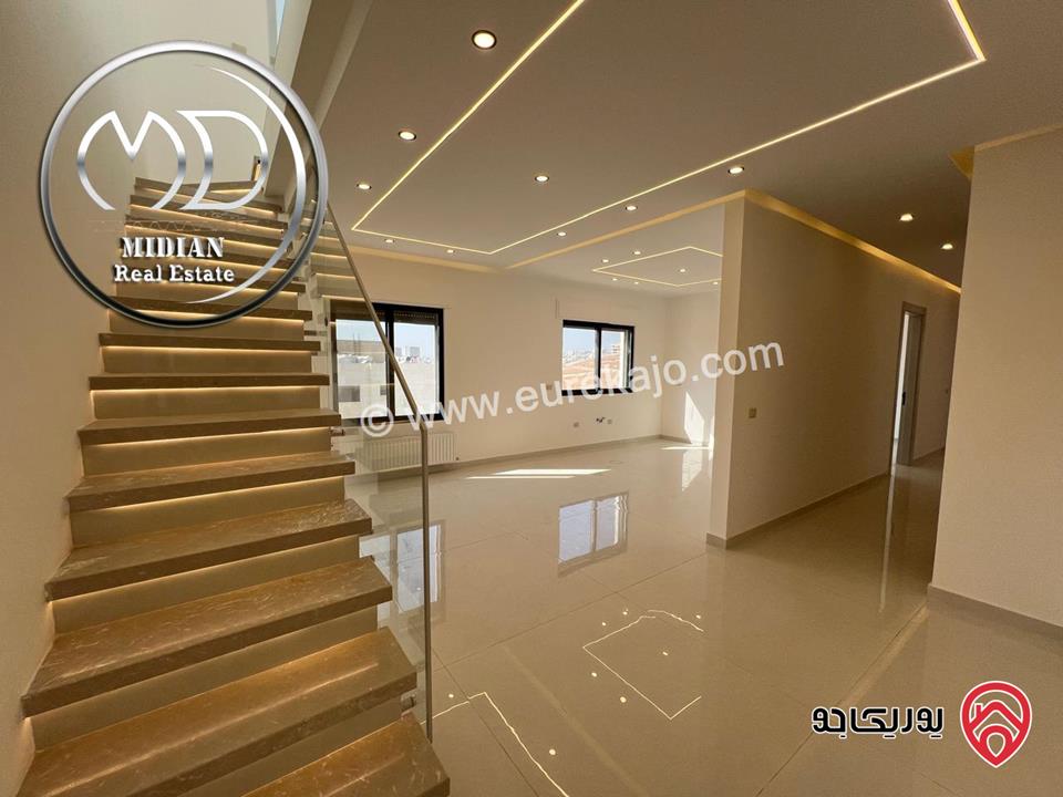 شقة دوبلكس جديدة طابق أخبر مع روف للبيع في عمان - حي الصحابة مساحة 215م مع تراسات اطلالة رائعة بسعر مميز