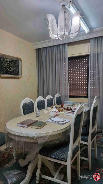 شقه للبيع في جبل الحسين طابق اول بناء قديم مساحتها 180متر