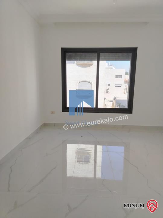 شقة فاخرة للبيع في عمان - خلدا قرب المدارس الإنجليزية طابق ثالث 280م مع روف دوبلكس 180م لم تسكن