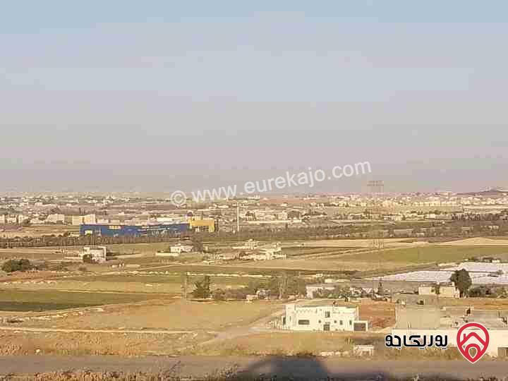 قطعة أرض مميزة جداً مساحة 800م سكن ب بأحكام خاصة على شارعين للبيع في عمان - حسبان مطلة على جامعة الزيتونة وايكيا واجهة جميلة مرتفعة ومطلة 