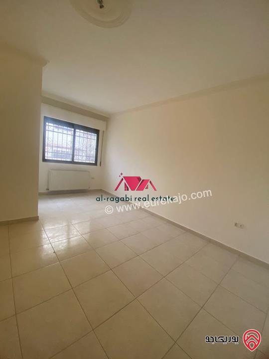 شقة فارغة شبه ارضية مساحة 165م للايجار في عمان - الرابية