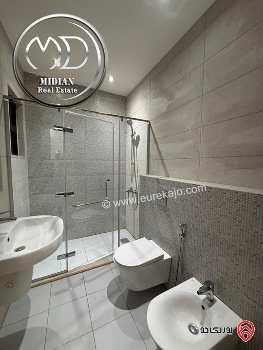 شقة شبه ارضي فارغة للايجار في عمان - خلدا العوجانية مساحة 250م 4 نوم مع تراسات و حدائق تشطيبات و ديكورات فاخرة