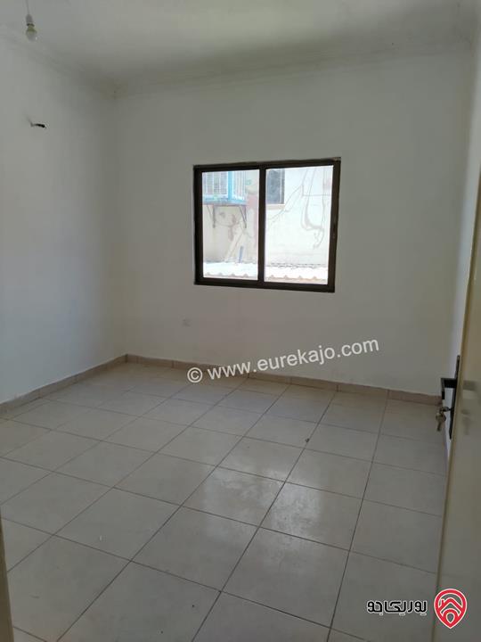 شقة طابق أول مساحة 100م للبيع في العقبة بسعر مميز 