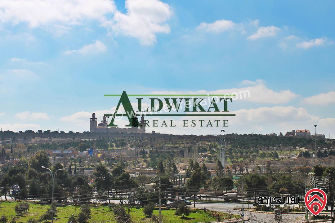 أرض ذات اطلالة رائعة للبيع في عمان - بالقرب من دابوق ( الدير ) مساحة 2300م