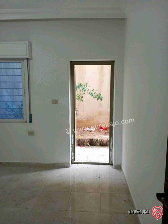 شقة أرضية مساحة 127م داخلي و 100م خارجي للبيع في عمان - ام نوارة