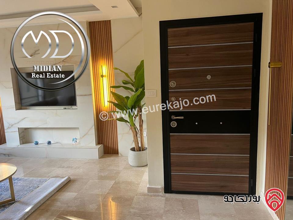 شقة شبه ارضي للبيع في عمان - دابوق مساحة 130م تشطيبات و ديكورات عصرية فاخرة اطلالة جميلة بسعر مميز جداً