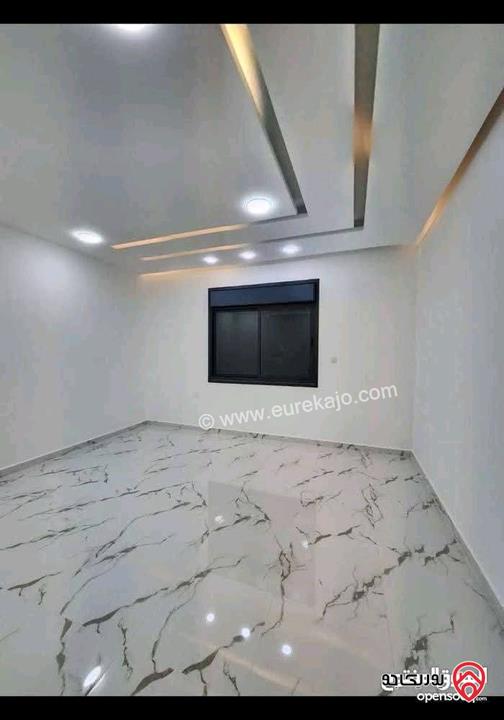 شقة طابق أول هندسي و رووف اطلالة بحرية مساحة 175 م² للبيع في العقبة - السكنية الخامسة تشطيب هايبر ديلوكس 