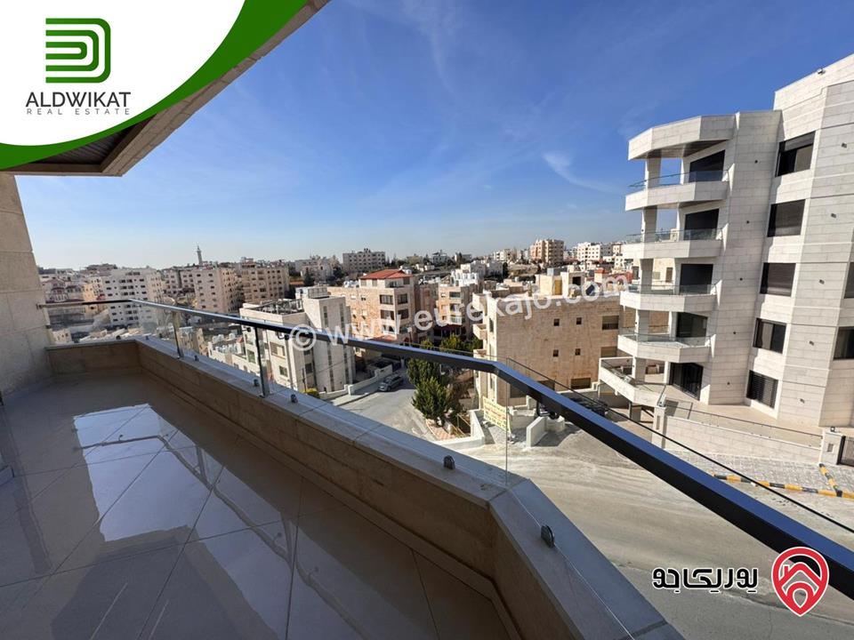 شقة طابقية مع روف للبيع في عمان - تلاع العلي مساحة البناء 260م ومساحة الترس 70م على شارعين