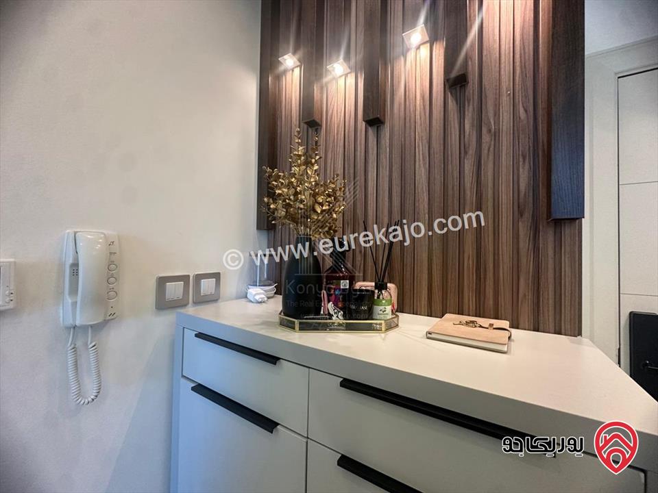 شقة مفروشة طابق ثاني مساحة 72م للبيع في عمان - العبدلي  برج داماك