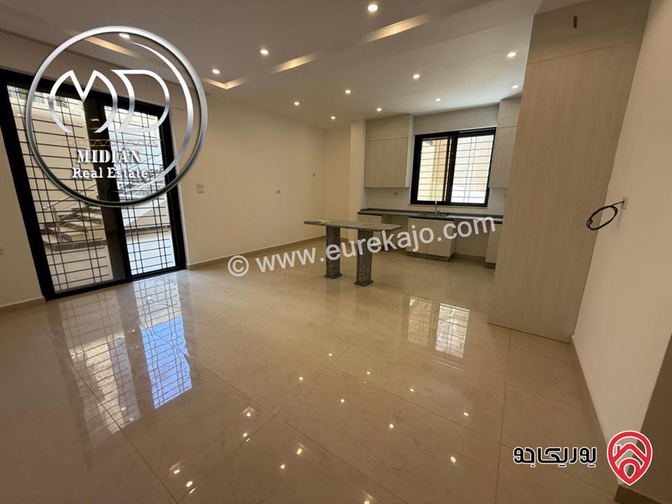 شقة فارغة أرضية مساحة 125م مع ترس 40م للايجار في عمان - عبدون جديدة لم تسكن