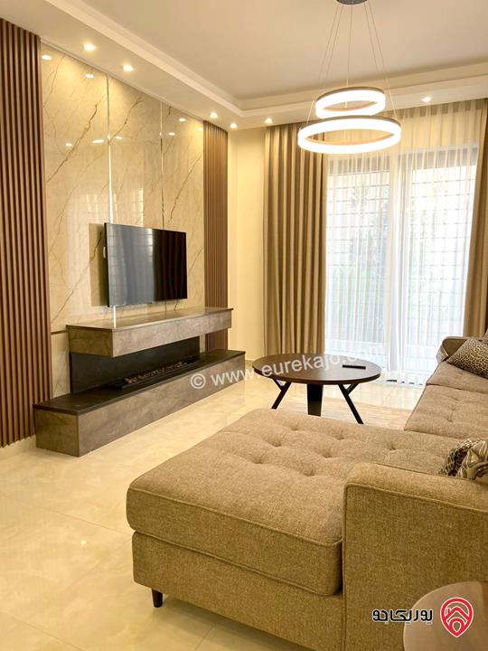 شقة فخمة مفروشة مساحة 100م مع حديقة 120م ومدخل خاص للإيجار في عمان - عبدون