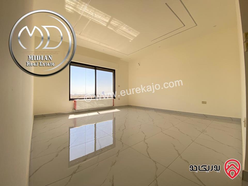 شقة دوبلكس جديدة طابق اخير مع روف للبيع في عمان - ضاحية الرشيد مساحة 250م مع تراسات تشطيبات سوبر ديلوكس اطلالة رائعة