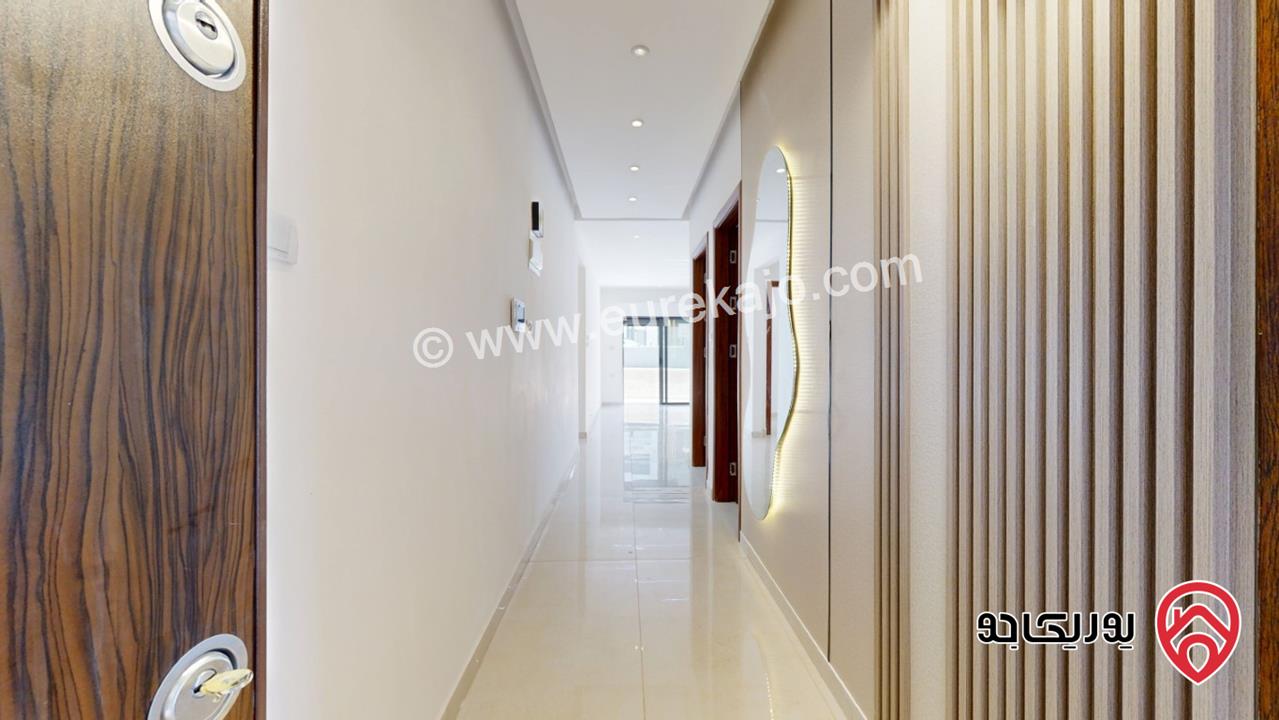 شقة طابق ارضي مساحة 184 م مع كراج و مدخل مستقل للبيع في عمان - الجبيهة حي المنصور 