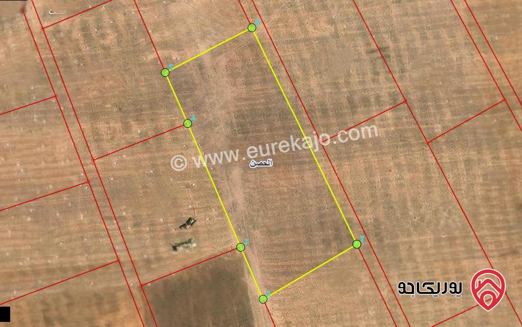 قطعة ارض مساحة 6 دونم و 96م للبيع في اربد - جنوب اسكان العاملين في جامعة اليرموك 