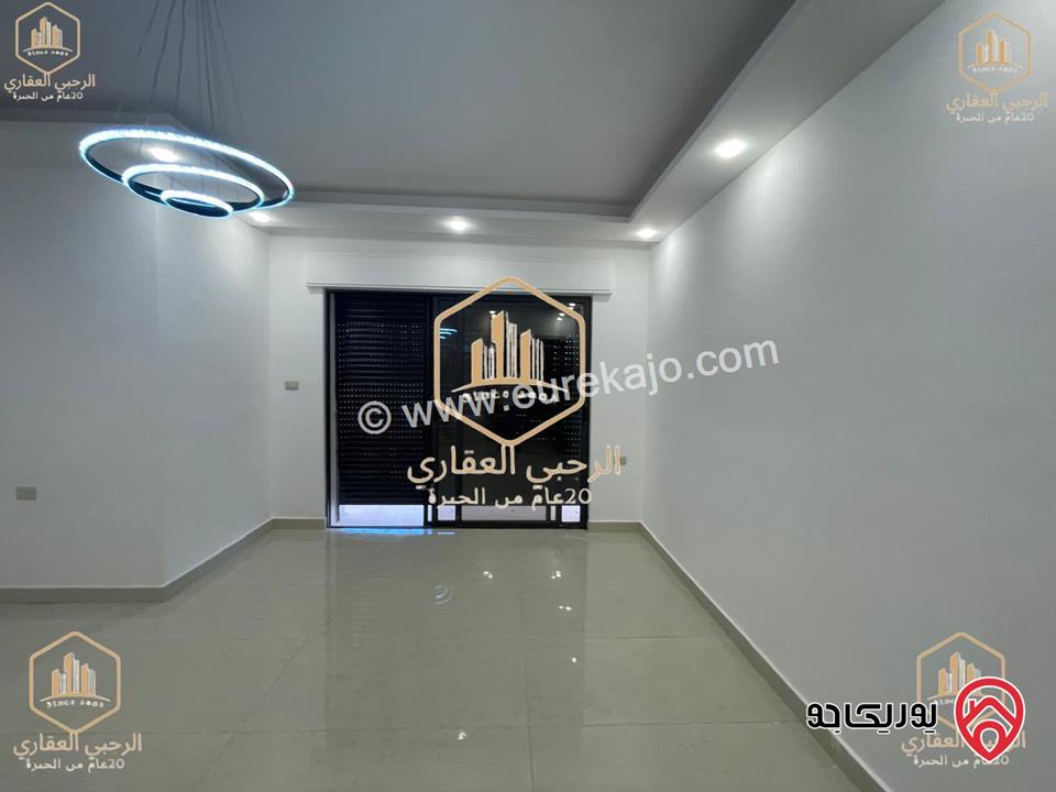 شقة ارضية جديدة مساحة 150م داخلي و 50م خارجي للايجار في عمان - الجندويل 