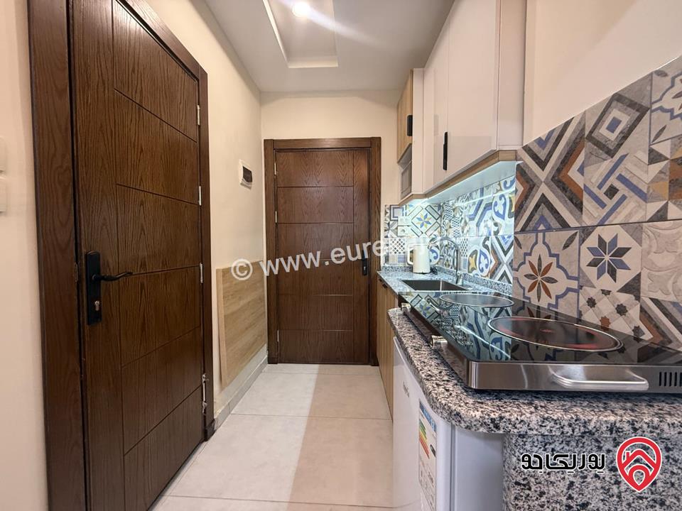 شقة استثمارية مساحة 160م فيها 7 استديوهات للبيع في عمان - الجبيهة قرب الجامعة الاردنية 