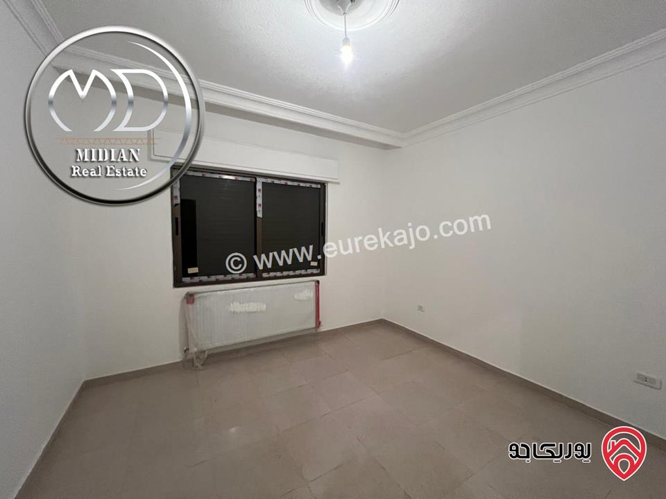 شقة ارضية جديدة فارغة للايجار في عمان - ضاحية الرشيد مساحة 150م مع ترس 50م تشطيبات سوبر ديلوكس بسعر مميز