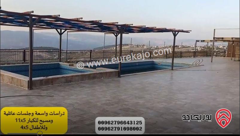 مزرعة مساحة الأرض 3500م والبناء طابقين دوبلكس 200م ومسبح للبيع في جرش - المصطبة