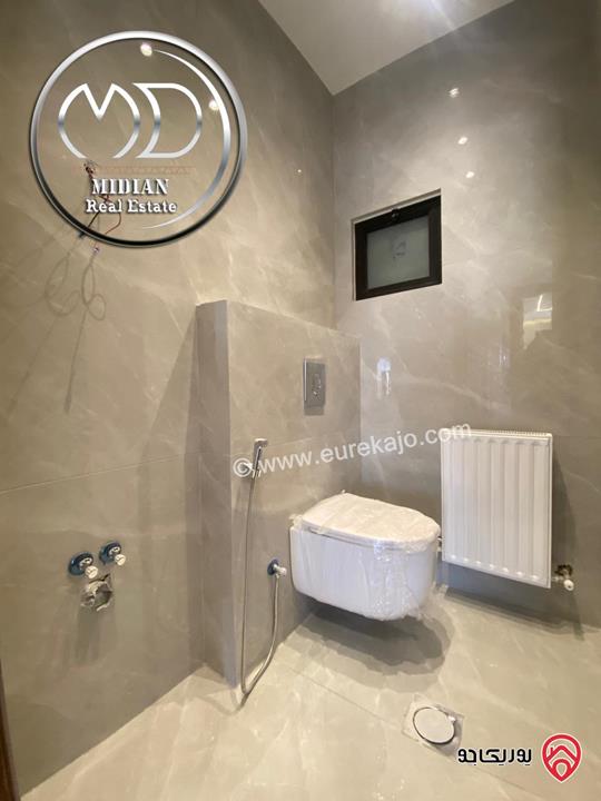 شقة ارضية جديدة للبيع في عمان - تلاع العلي مساحة 210م مع ترس و حديقة 140م تشطيبات ديكورات عصرية فاخرة بسعر مميز