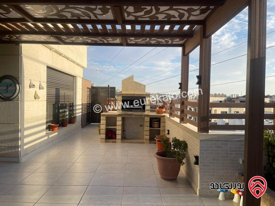 شقة طابق أخير مع روف مساحة 345م + ترس 60م للبيع في عمان - طريق المطار النخيل