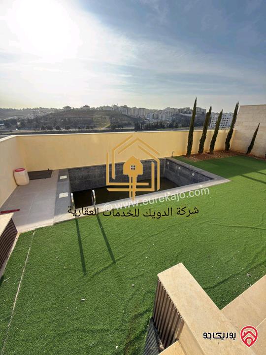 شقة سوبر ديلوكس شبه أرضية مساحة 215م مع ترس 175م للإيجار في عمان - طريق المطار