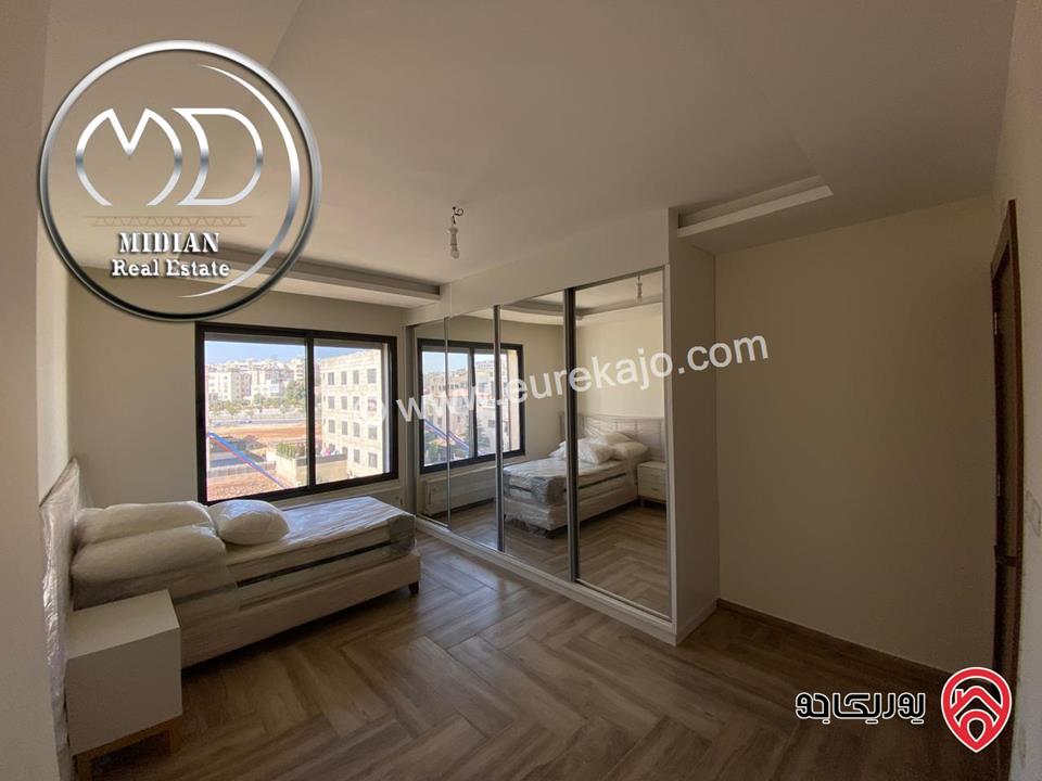 شقة دوبلكس جديدة فارغة للايجار في عمان - ضاحية النخيل طابق اخير مع روف مساحة 250م مع تراسات تشطيبات و ديكورات عصرية فاخرة