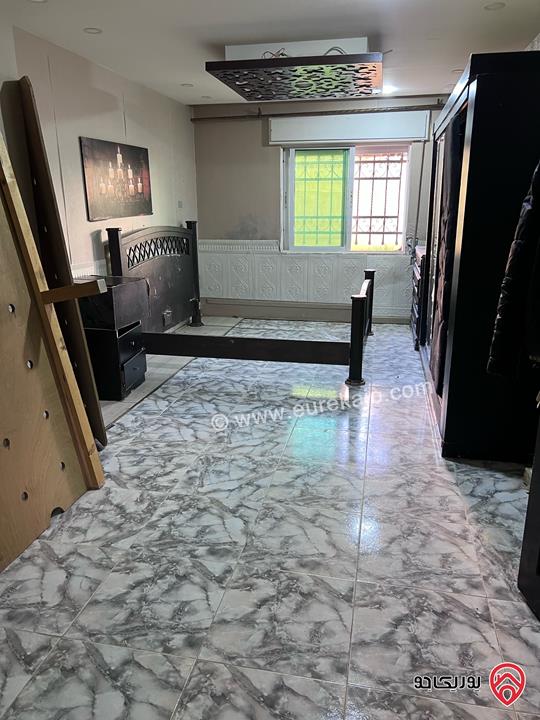 شقة شبه أرضية مساحة 100م داخلي و 100م خارجي للبيع في عمان - الجبيهة 