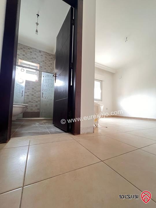 شقة شبه ارضية مساحة 110م للايجار في عمان - خلدا