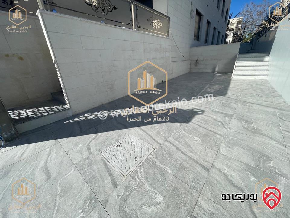 شقة ارضية مساحة 145م مع ترس خارجي 135م للايجار في عمان - الجندويل