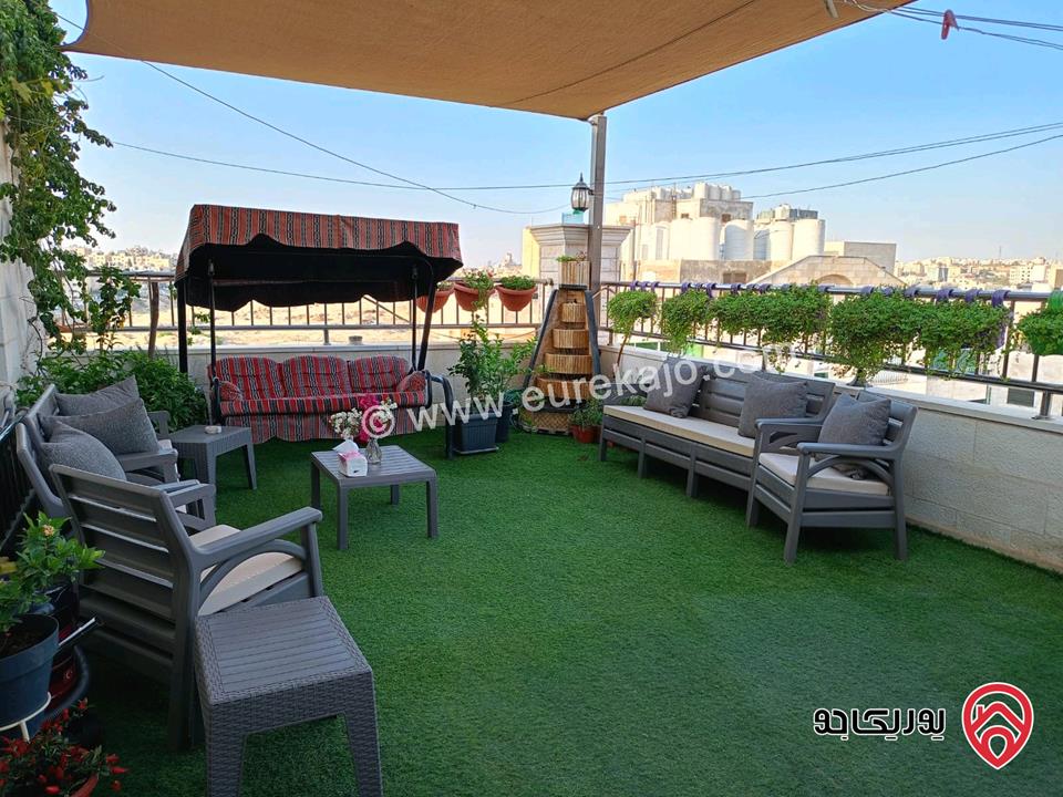 شقة طابق أخير مع روف مساحة 320م للبيع في عمان - مرج الحمام