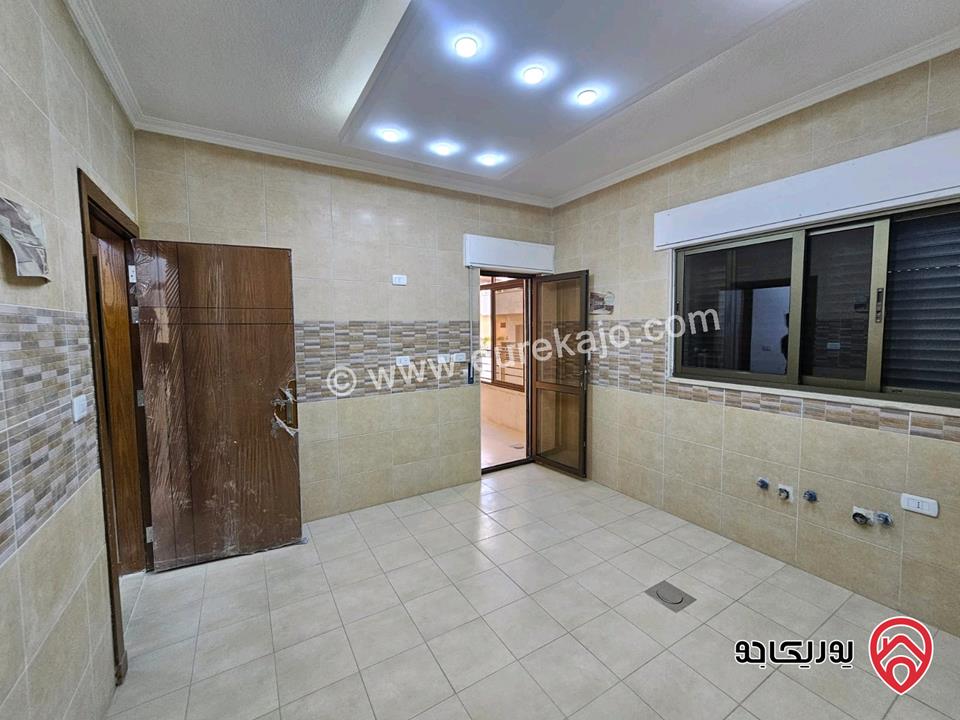 شقه 165 متر طابق ارضي للبيع في عمان - الجبيهة ضاحية المنصور