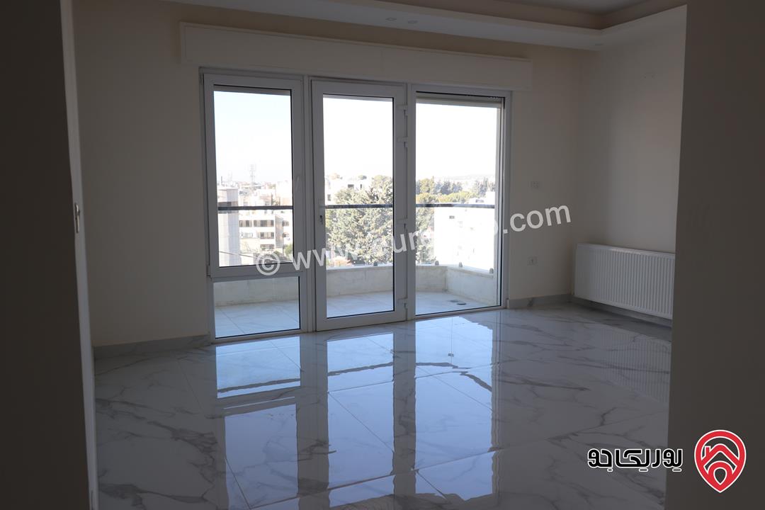 شقة جديدة 183م طابق ثالث للبيع في عمان - خلدا بإطلالة رائعة وموقع هادئ