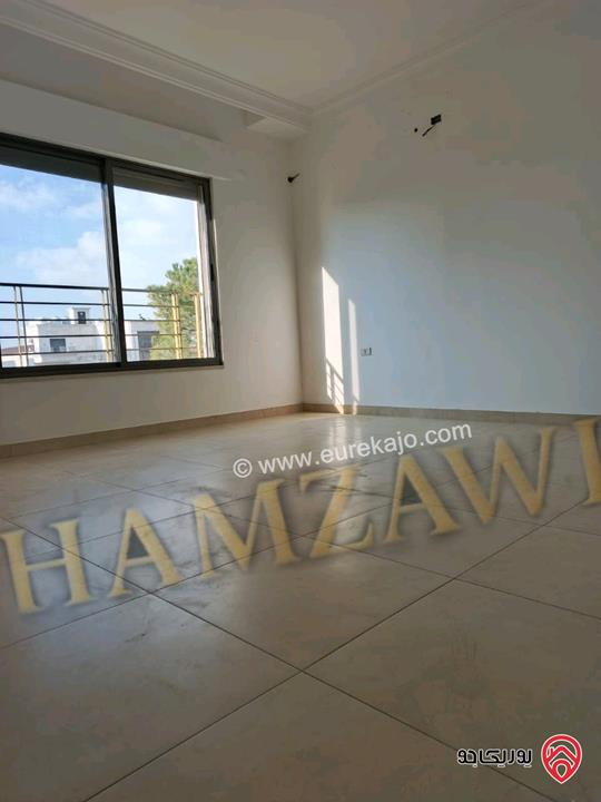 شقة مميزة شبه ارضية مساحة 200م داخلي و 120م خارجي للايجار في عمان - حي الصحابة 